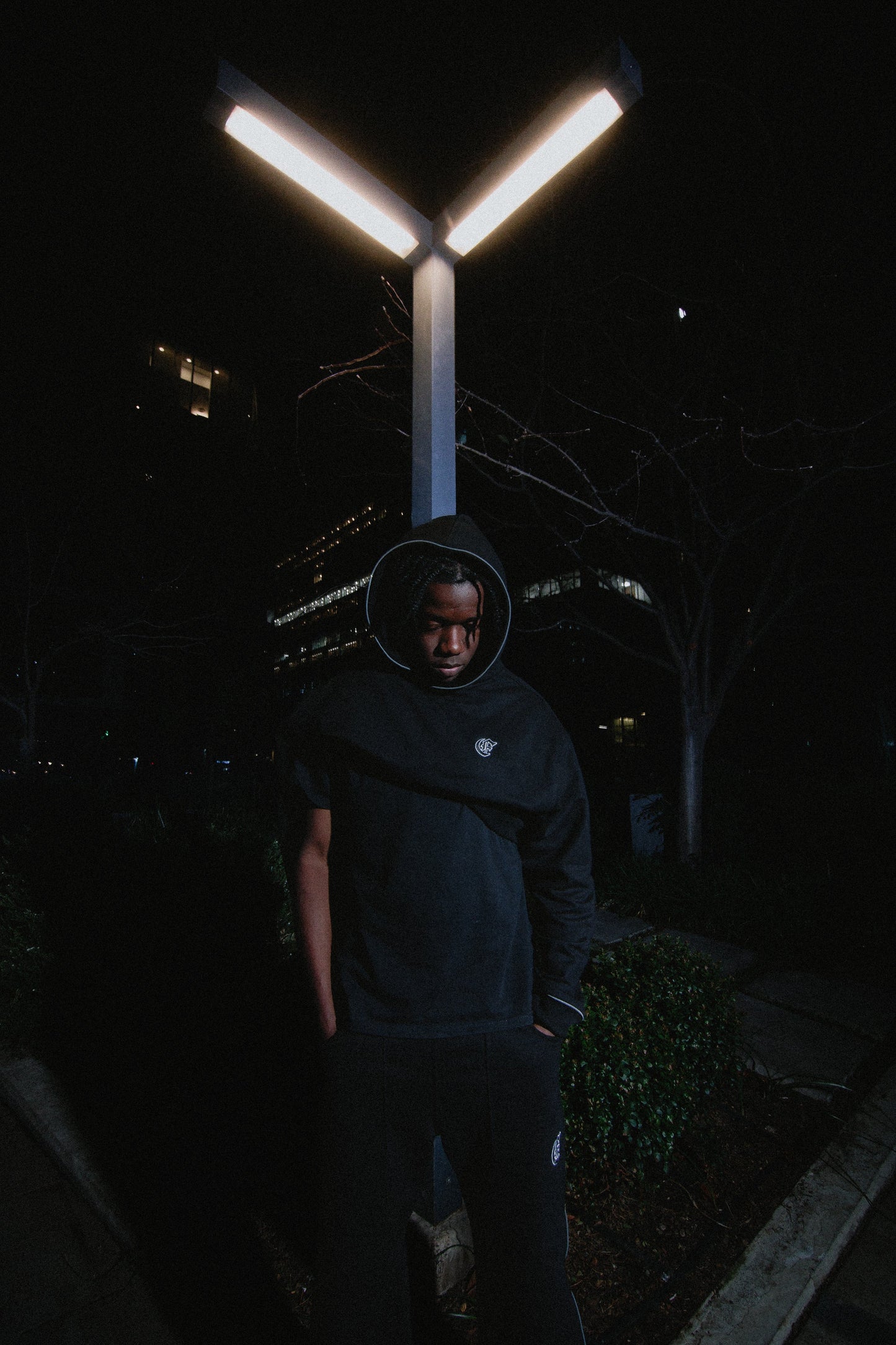 Polerón reflectante negro